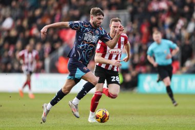 Blackpool 'dan Tom Bloxham, 25 Ocak 2025' te St James 'Park, Exeter, Birleşik Krallık' ta oynanan Sky Bet 1 karşılaşmasında topu düşürüyor.