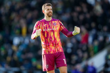 Norwich City 'den Angus Gunn, 25 Ocak 2025' te Norwich City ile Swansea City arasındaki Sky Bet Şampiyonası maçının ardından kazandığı galibiyeti kutluyor.