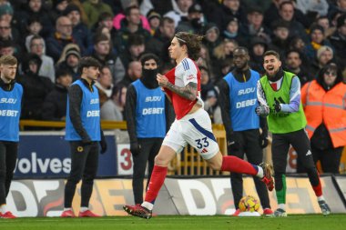 Riccardo Calafiori of Arsenal celebrates his goal to make it 0-1 during the Premier League match Wolverhampton Wanderers vs Arsenal at Molineux, Wolverhampton, United Kingdom, 25th January 2025 clipart