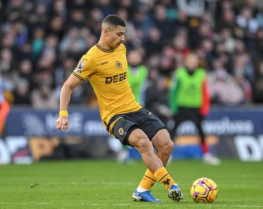 Wolverhampton Wanderers takımının Andr 'ı Premier League maçında Wolverhampton Wanderers Arsenal' e karşı Molineux, Wolverhampton, Birleşik Krallık 'ta 25 Ocak 2025' te pas attı.