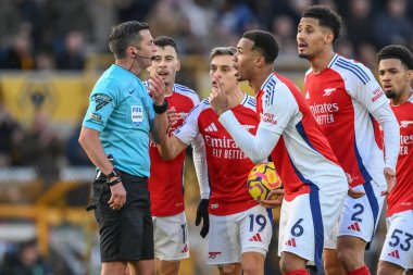 Gabriel of Arsenal appeals a red card for Myles Lewis-Skelly of Arsenal during the Premier League match Wolverhampton Wanderers vs Arsenal at Molineux, Wolverhampton, United Kingdom, 25th January 2025 clipart