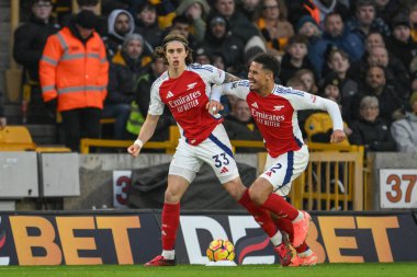 Riccardo Calafiori of Arsenal celebrates his goal to make it 0-1 during the Premier League match Wolverhampton Wanderers vs Arsenal at Molineux, Wolverhampton, United Kingdom, 25th January 2025 clipart