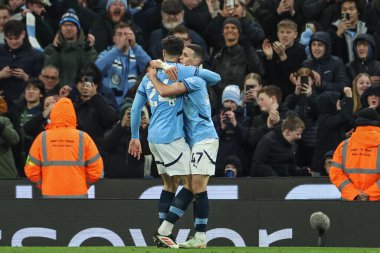 Manchester City 'den Phil Foden, 25 Ocak 2025' te Etihad Stadyumu 'nda oynanan Premier League maçında 3-1' lik galibiyetini kutluyor.