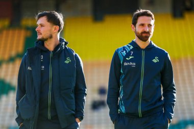 Liam Cullen and Joe Allen of Swansea City AFC arrives at Carrow Road prior to the Sky Bet Championship match Norwich City vs Swansea City at Carrow Road, Norwich, United Kingdom, 25th January 2025 clipart