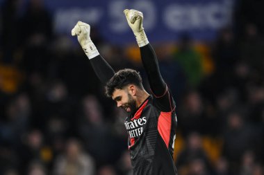 Arsenal 'den David Raya, 25 Ocak 2025' te Molineux, Wolverhampton, Birleşik Krallık 'ta oynanan Premier League maçının sonunda zaferini kutluyor.