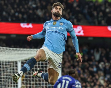Manchester City 'den Joko Gvardiol, 25 Ocak 2025' te Etihad Stadyumu 'nda oynanan Premier League maçında 1-1' lik galibiyetini kutluyor.