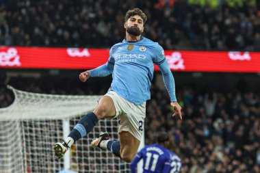 Manchester City 'den Joko Gvardiol, 25 Ocak 2025' te Etihad Stadyumu 'nda oynanan Premier League maçında 1-1' lik galibiyetini kutluyor.