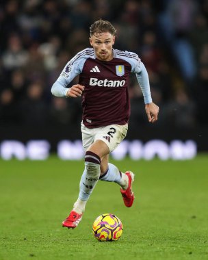 Matty Cash of Aston Villa makes a break with the ball during the Premier League match Aston Villa vs West Ham United at Villa Park, Birmingham, United Kingdom, 26th January 2025 clipart