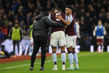 Tyrone Mings of Aston Villa is forced from the field with an injury during the Premier League match Aston Villa vs West Ham United at Villa Park, Birmingham, United Kingdom, 26th January 2025 clipart