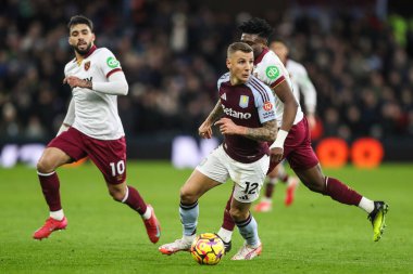 Lucas Digne of Aston Villa passes makes a break with the ball during the Premier League match Aston Villa vs West Ham United at Villa Park, Birmingham, United Kingdom, 26th January 2025 clipart