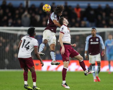 Boubacar Kamara of Aston Villa wins the header over Andy Irving of West Ham United during the Premier League match Aston Villa vs West Ham United at Villa Park, Birmingham, United Kingdom, 26th January 2025 clipart