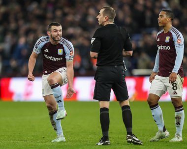 John McGinn of Aston Villa reacts to Referee Peter Bankes decision during the Premier League match Aston Villa vs West Ham United at Villa Park, Birmingham, United Kingdom, 26th January 2025 clipart