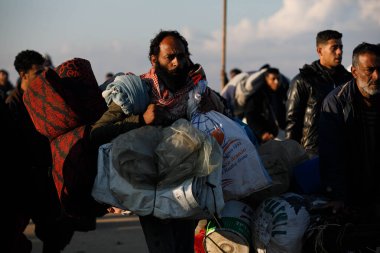 Tens of thousands of displaced people began returning to their homes from the south of the Gaza Strip to the north this morning, after being forcibly displaced due to the war on the Gaza Strip for more than 15 months  clipart