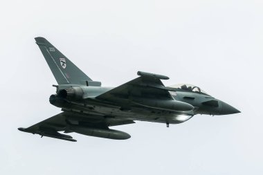 An RAF Typhoon FGR4 takes off at RAF Coningsby, Coningsby, United Kingdom, 28th January 2025 clipart