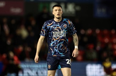 Blackpool takımından Oliver Casey 28 Ocak 2025 'te Gelder Group Sincil Bank Stadyumu' nda oynanan 1.