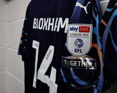 Blackpool takımından Tom Bloxham 'ın 28 Ocak 2025' te Gelder Group Sincil Bank Stadyumu 'nda oynanan 1.