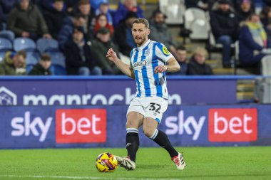 Tom Lees Huddersfield Town, 28 Ocak 2025 tarihinde İngiltere 'nin Huddersfield şehrindeki John Smith Stadyumu' nda oynanan Huddersfield Town - Birmingham City maçında pas attı.