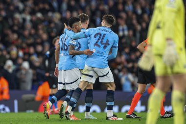 Manchester City 'den Svio, 29 Ocak 2025 tarihinde Etihad Stadyumu' nda oynanan 8 Manchester City vs Club Brugge maçında UEFA Şampiyonlar Ligi Maçı 'na 3-1' lik galibiyetini kutluyor.