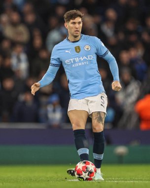 Manchester City 'den John Stones UEFA Şampiyonlar Ligi Maçı sırasında 8 Manchester City ile Brugge maçında Etihad Stadyumu, Manchester, Birleşik Krallık, 29 Ocak 2025
