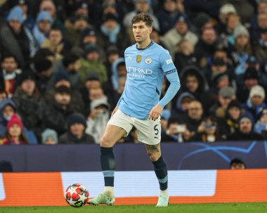 Manchester City 'den John Stones UEFA Şampiyonlar Ligi Maçı sırasında 8 Manchester City ile Brugge maçında Etihad Stadyumu, Manchester, Birleşik Krallık, 29 Ocak 2025
