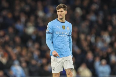 Manchester City 'den John Stones UEFA Şampiyonlar Ligi Maçı sırasında 8 Manchester City ile Brugge maçında Etihad Stadyumu, Manchester, Birleşik Krallık, 29 Ocak 2025