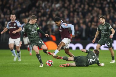 Ian Maatsen of Aston Villa is tackled by Alistair Johnston of Celtic during the UEFA Champions League Matchday 8 of 8 Aston Villa vs Celtic at Villa Park, Birmingham, United Kingdom, 29th January 2025 clipart