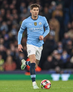 Manchester City 'den John Stones UEFA Şampiyonlar Ligi Maçı sırasında 8 Manchester City ile Brugge maçında Etihad Stadyumu, Manchester, Birleşik Krallık, 29 Ocak 2025