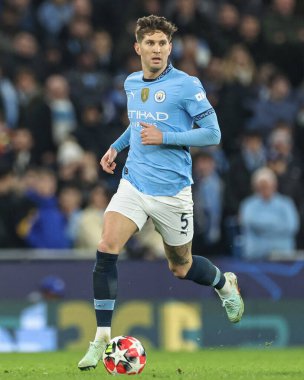 Manchester City 'den John Stones UEFA Şampiyonlar Ligi Maçı sırasında 8 Manchester City ile Brugge maçında Etihad Stadyumu, Manchester, Birleşik Krallık, 29 Ocak 2025