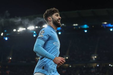 Manchester City 'den Joko Gvardiol, Manchester Stadyumu' nda 28 Ocak 2025 tarihinde oynanan 8 Manchester City vs Club Brugge karşılaşmasında Club Brugge 'den Joel Ordez' in attığı golü kutluyor.