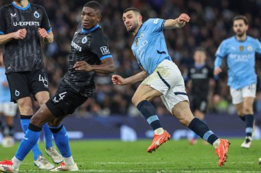 Manchester City 'den Mateo Kovai, 29 Ocak 2025 tarihinde Etihad Stadyumu, Manchester, İngiltere' de oynanan 8 Manchester City vs Club Brugge maçında UEFA Şampiyonlar Ligi maçında 1-1 kazanma hedefini kutluyor.