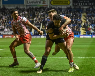 Warrington Wolves 'un Toby King' i Leigh Leopards 'dan Keanan Brand tarafından 1 Şubat 2025' te Halliwell Jones Stadyumu 'nda oynanan Warrington Wolves - Leigh Leopards maçında yenildi.