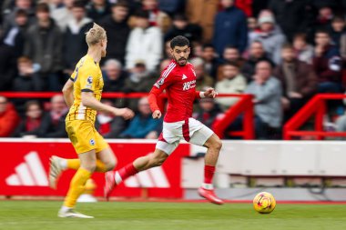 Nottingham Ormanı 'ndan Morgan Gibbs-White Premier League maçında Nottingham Forest, Brighton ve Hove Albion' a karşı 1 Şubat 2025 'te Nottingham, İngiltere' de oynanan City Ground 'da topu bırakıyor.