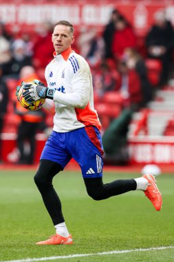 Nottingham Ormanı 'ndan Matz Sels, Nottingham Forest' a karşı Brighton ve Hove Albion maçından önce 1 Şubat 2025 'te İngiltere' nin Nottingham şehrinde ısınıyor.
