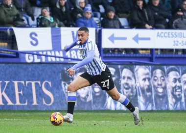 Sheffield Wednesday 'den Yan Valery, 1 Şubat 2025' te İngiltere 'nin başkenti Hillsborough' da oynanan Sheffield Wednesday-Luton Town maçında topu ileri sürüyor.