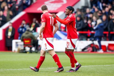 Nottingham Ormanı 'ndan Chris Wood, İngiltere' nin Nottingham şehrinde 1 Şubat 2025 'te oynanan Premier Lig maçı Nottingham Forest ve Hove Albion maçında Anthony Elanga' ya verdiği penaltıyı 5-0 yenerek kutluyor.