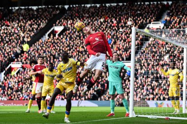 Manchester United 'dan Manuel Ugarte Premier Lig karşılaşmasında topu oyunda tutmak için Manchester United' a karşı Old Trafford, Manchester, Birleşik Krallık 'ta 2 Şubat 2025' te Crystal Palace maçında lider.