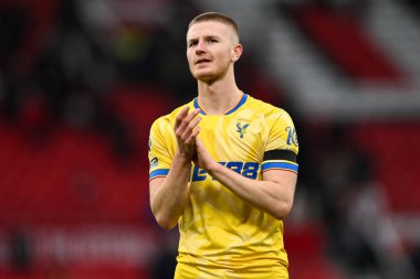 Kristal Saray 'dan Adam Wharton, Premier League maçının ardından Manchester United' ın Old Trafford, Manchester, Birleşik Krallık 'ta 2 Şubat 2025 tarihinde oynadığı Crystal Palace maçından sonra gezgin taraftarları alkışlıyor.
