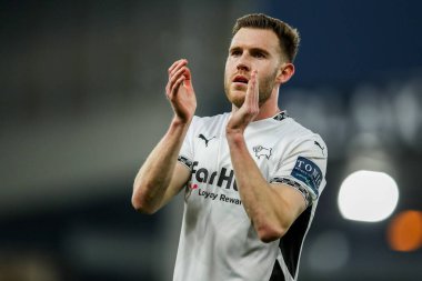 Callum Elder of Derby County acknowledges the fans after the teams draw following the Sky Bet Championship match Norwich City vs Derby County at Carrow Road, Norwich, United Kingdom, 8th February 2025 clipart