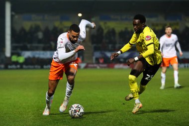 CJ Hamilton of Blackpool breaks with the ball during the Sky Bet League 1 match Burton Albion vs Blackpool at Pirelli Stadium, Burton upon Trent, United Kingdom, 8th February 2025 clipart