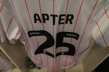 The shirt of Rob Apter of Blackpool hanging in the changing room ahead of the Sky Bet League 1 match Burton Albion vs Blackpool at Pirelli Stadium, Burton upon Trent, United Kingdom, 8th February 2025 clipart