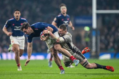 Fransa 'dan Damian Penaud, 2025 Guinness 6 Milletler arası Allianz Stadyumu, Twickenham, Birleşik Krallık' ta oynanan karşılaşmada İngiliz Tom Willis tarafından yenildi.