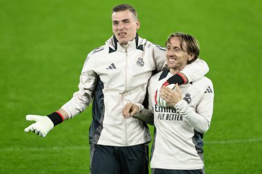 Real Madrid 'den Andriy Lunin ve Real Madrid' den Luka Modri, 10 Şubat 2025 'te Etihad Stadyumu' ndaki UEFA Şampiyonlar Ligi Real Madrid antrenman oturumunda.