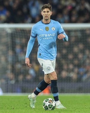 Manchester City 'den John Stones UEFA Şampiyonlar Ligi Knockout Round Play-off Manchester City - Real Madrid maçı sırasında Etihad Stadyumu, Manchester, Birleşik Krallık, 11 Şubat 2025