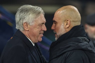 Carlo Ancelotti Real Madrid teknik direktörü ve UEFA Şampiyonlar Ligi Knockout Play-off Manchester City - Real Madrid maçı sırasında Manchester City 'nin Pep Guardiola teknik direktörü, Etihad Stadı, Manchester, İngiltere, 11 Şubat 2025