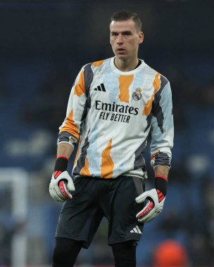 Real Madrid 'den Andriy Lunin 11 Şubat 2025' te Etihad Stadyumu 'nda oynanan UEFA Şampiyonlar Ligi play-off Manchester City - Real Madrid maçında ısınma turunda