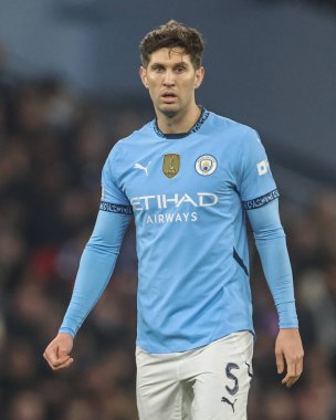 Manchester City 'den John Stones UEFA Şampiyonlar Ligi Knockout Round Play-off Manchester City - Real Madrid maçı sırasında Etihad Stadyumu, Manchester, Birleşik Krallık, 11 Şubat 2025