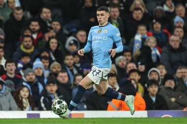 Manchester City 'den Phil Foden, 11 Şubat 2025 tarihinde Etihad Stadyumu' nda oynanan Manchester City - Real Madrid maçında, UEFA Şampiyonlar Ligi Knockout Round Play-off maçında topu aldı.