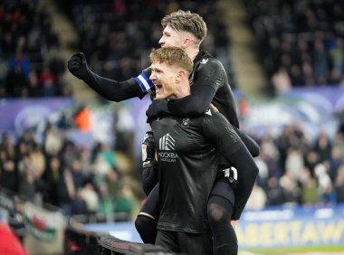 Sheffield Wednesday 'den Michael Smith, 12 Şubat 2025' te İngiltere 'nin Swansea.com Stadyumu' nda oynanan Swansea City-Sheffield maçında takımının ilk golünü atmasını kutluyor.