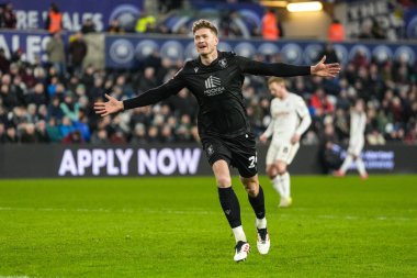 Sheffield Wednesday 'den Michael Smith, 12 Şubat 2025' te İngiltere 'nin Swansea.com Stadyumu' nda oynanan Swansea City-Sheffield maçında takımının ilk golünü atmasını kutluyor.