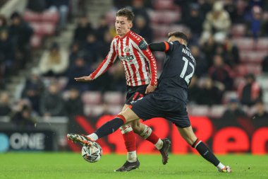 Sunderland 'dan Chris Rigg, 12 Şubat 2025' te Sunderland-Luton Town Stadyumu 'nda oynanan Sky Bet Şampiyonası karşılaşmasında Luton Town' dan Kal Naismith tarafından yenildi.